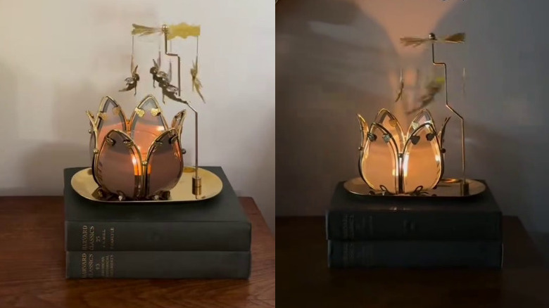 Dönen peri mum atlıkarıncaya sahip vintage bir lotus mumluk