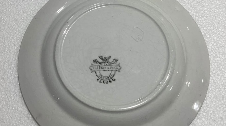 Villeroy & Boch antika plakasındaki cıva işaretinin yakından görünümü, muhtemelen 1899 dolaylarında