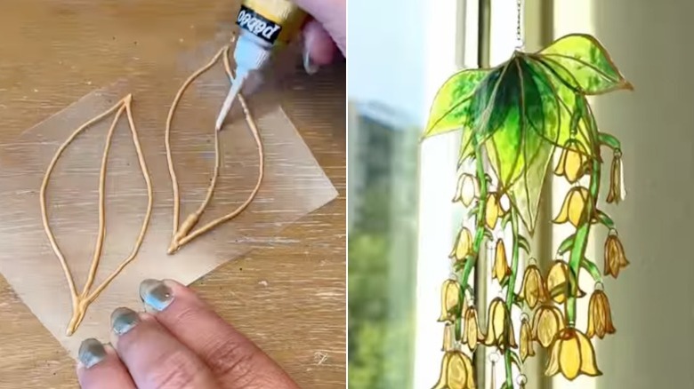 Altın rölyef boya ve bir evin güneşli penceresine asılı bir güneş tutucu kullanarak plastik üzerine yaprak çizmek.